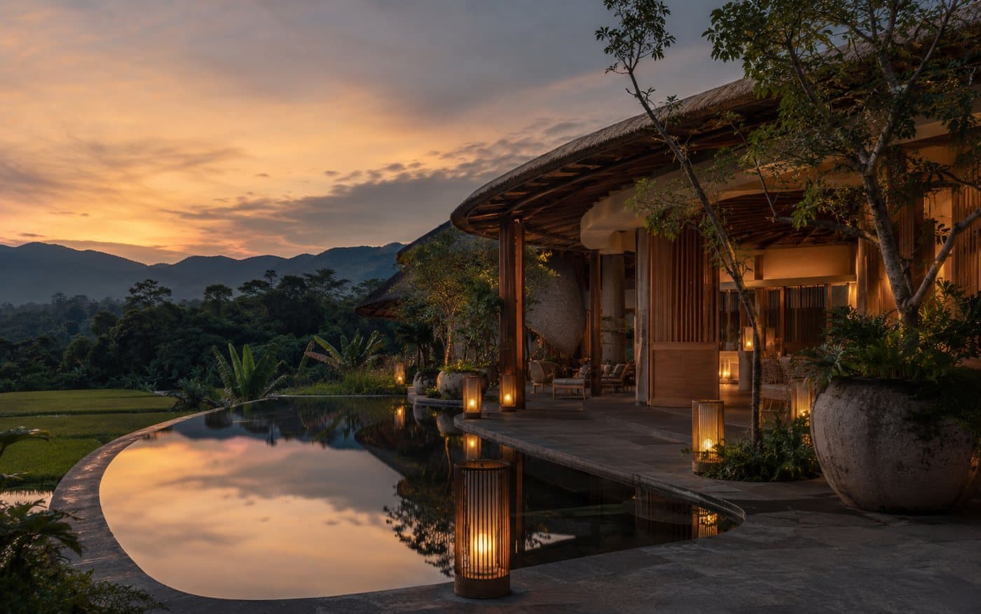 Khu nghỉ dưỡng với hồ nước phản chiếu hoàng hôn trên núi — dòng Signature Retreat